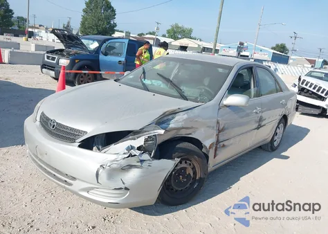 2002 Toyota Camry Le from USA, damaged, VIN 4T1BE32K82U102485